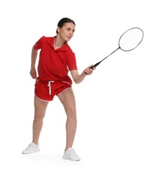 Photo of Young woman playing badminton with racket on white background