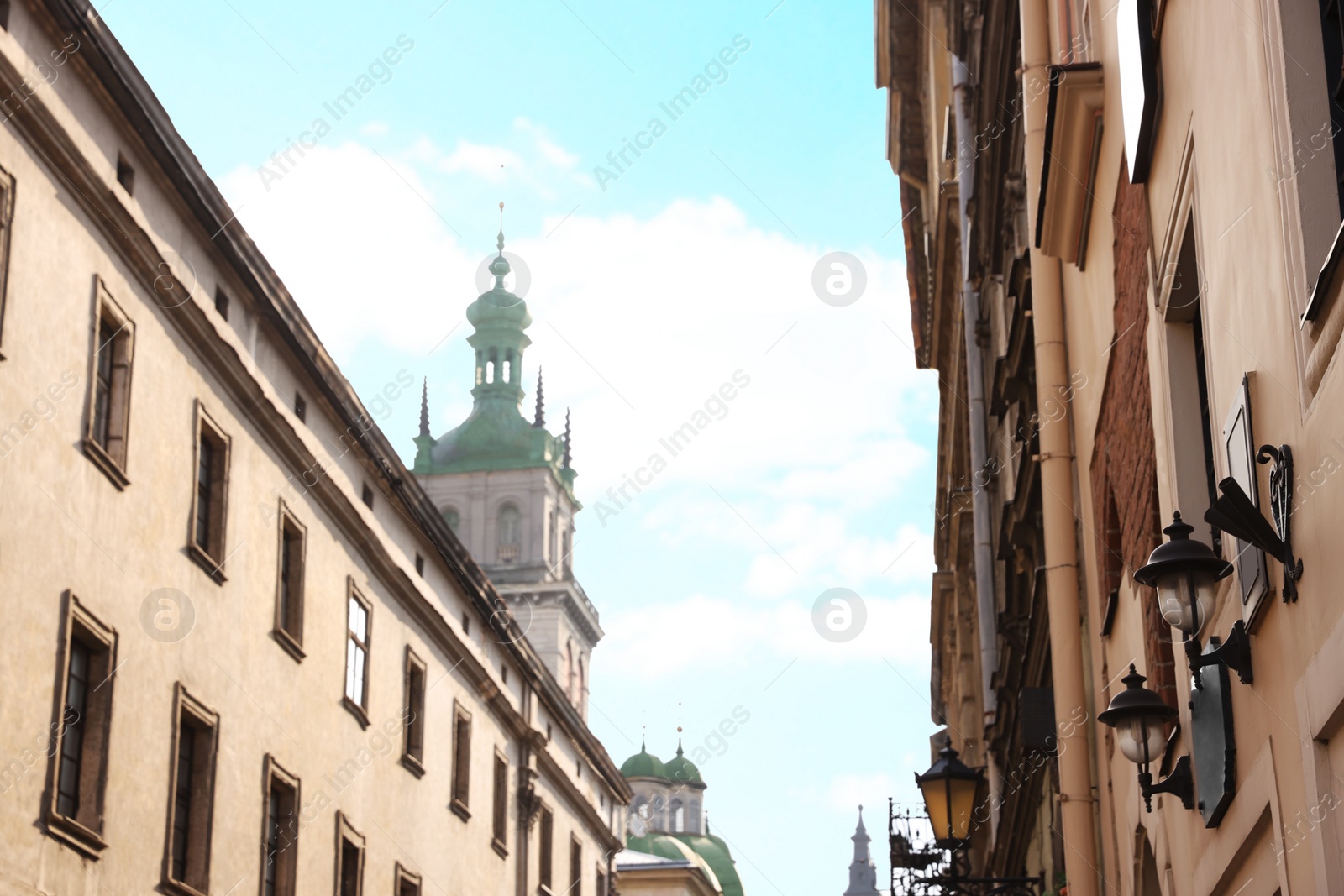 Photo of National flag of Ukraine on building facade, low angle view. Space for text