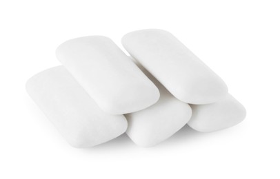 Photo of Pile of tasty chewing gums on white background