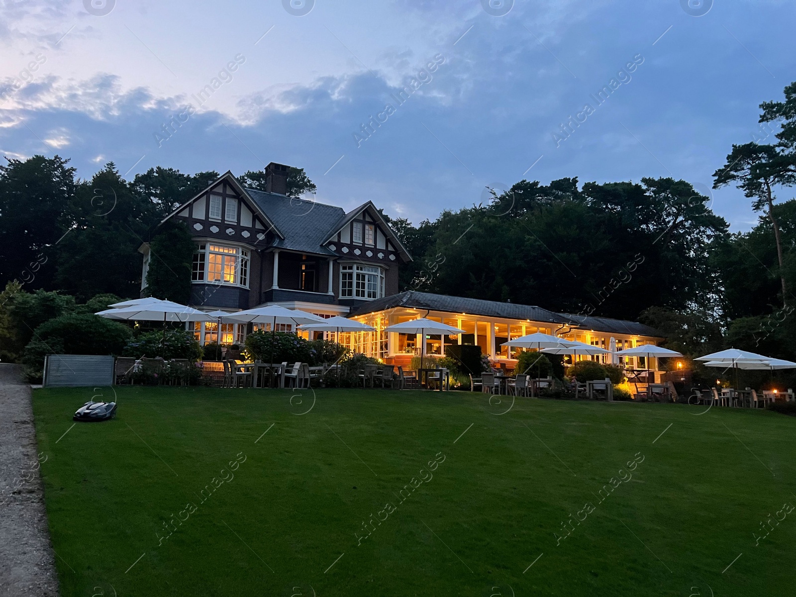 Photo of Ermelo, Netherlands - July 20, 2022: Luxury hotel Het Roode Koper and beautiful green plants