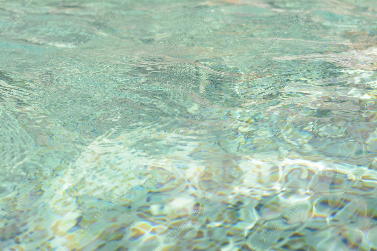 Photo of Rippled water in swimming pool as background