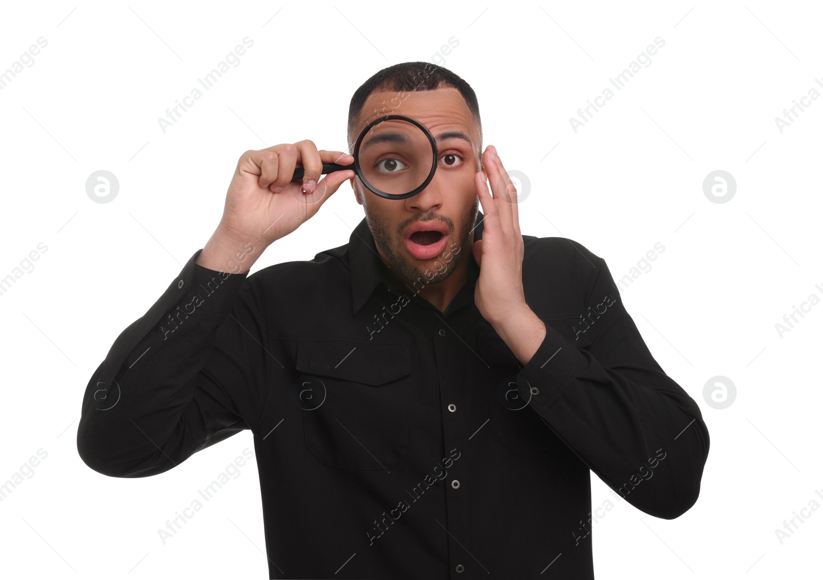 Photo of Shocked man looking through magnifier glass on white background