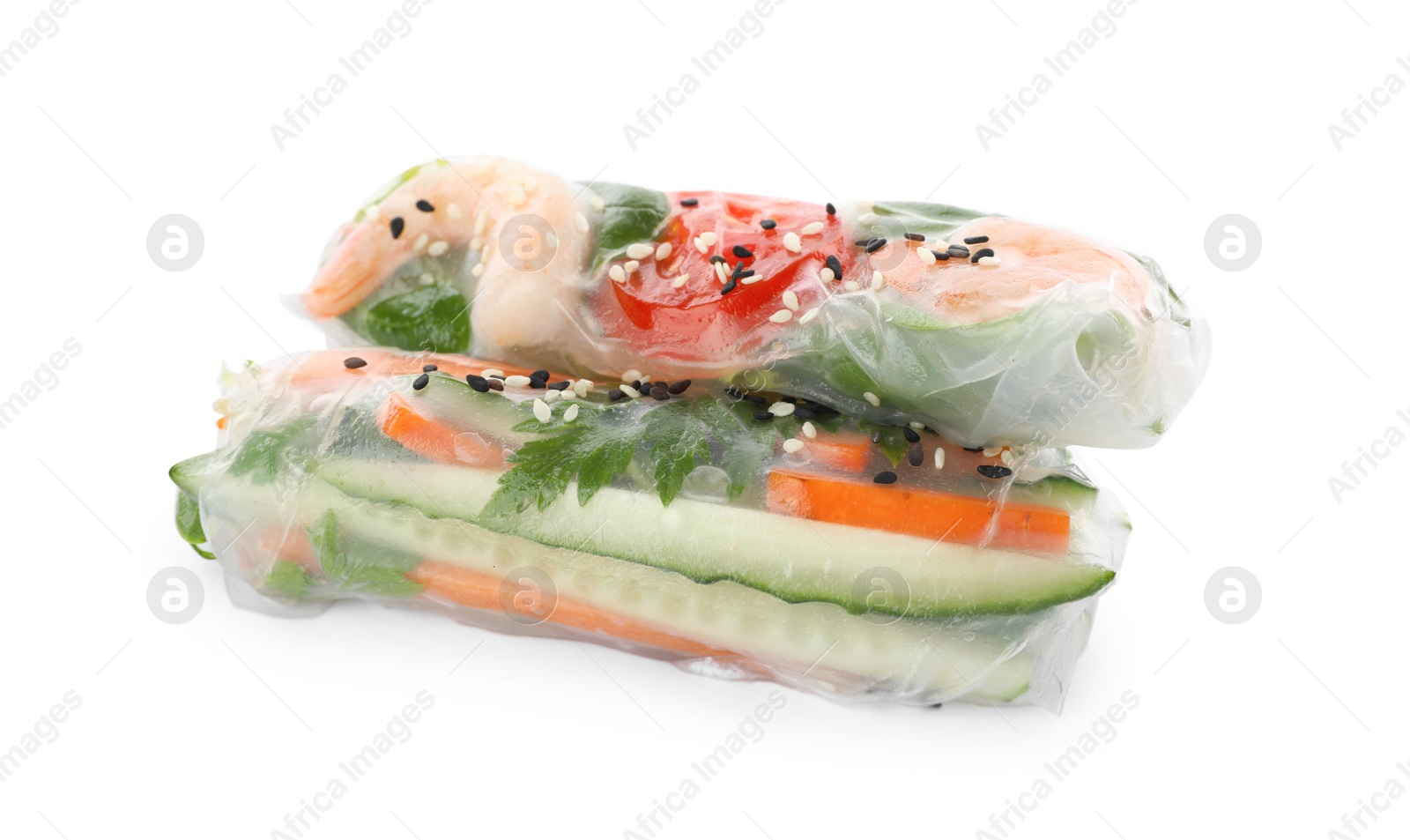 Photo of Different rolls wrapped in rice paper on white background, closeup
