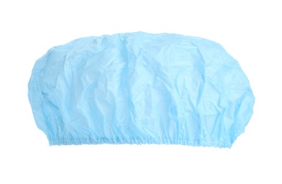 Photo of Light blue waterproof shower cap on white background