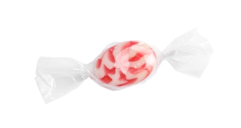 Photo of Wrapped delicious colorful candy on white background