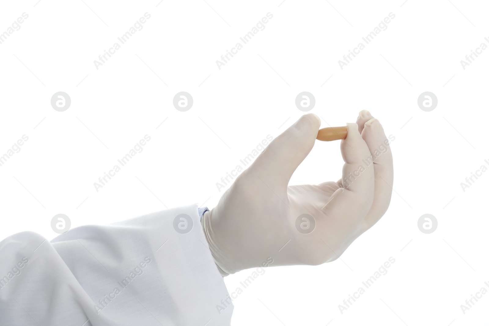 Photo of Doctor holding suppository for hemorrhoid treatment on white background, closeup