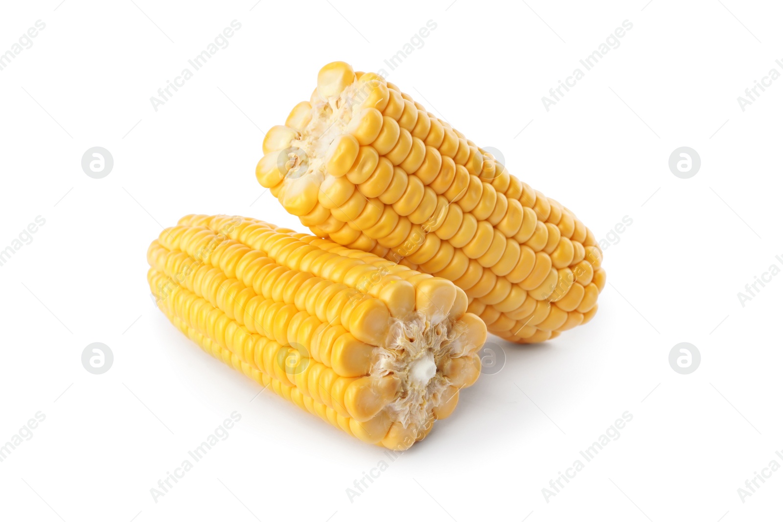 Photo of Pieces of ripe raw corn cob on white background