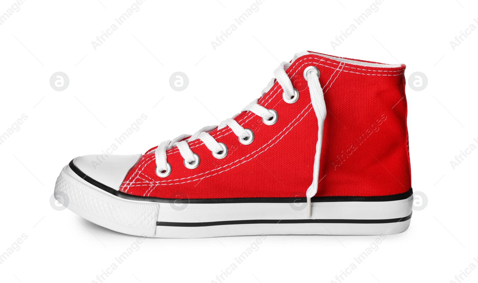 Photo of One sneaker isolated on white. Trendy shoes