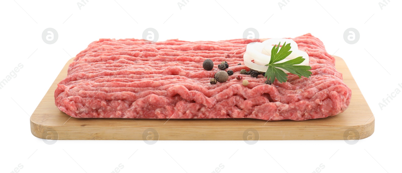 Photo of Board with raw ground meat, onion, peppercorns and parsley isolated on white