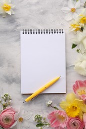 Photo of Guest list. Notebook, pen and beautiful flowers on gray textured background, flat lay