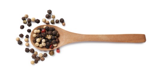 Aromatic spices. Different peppers in wooden spoon isolated on white, top view