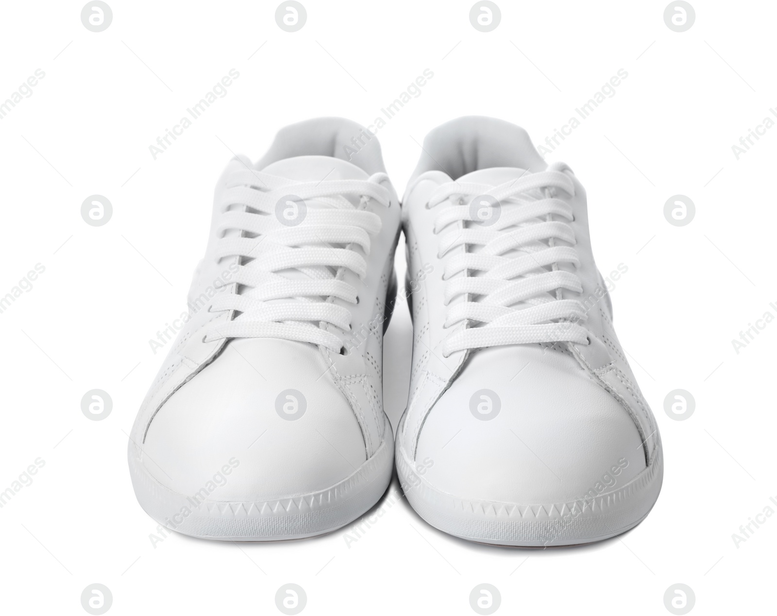 Photo of Pair of trendy sneakers on white background