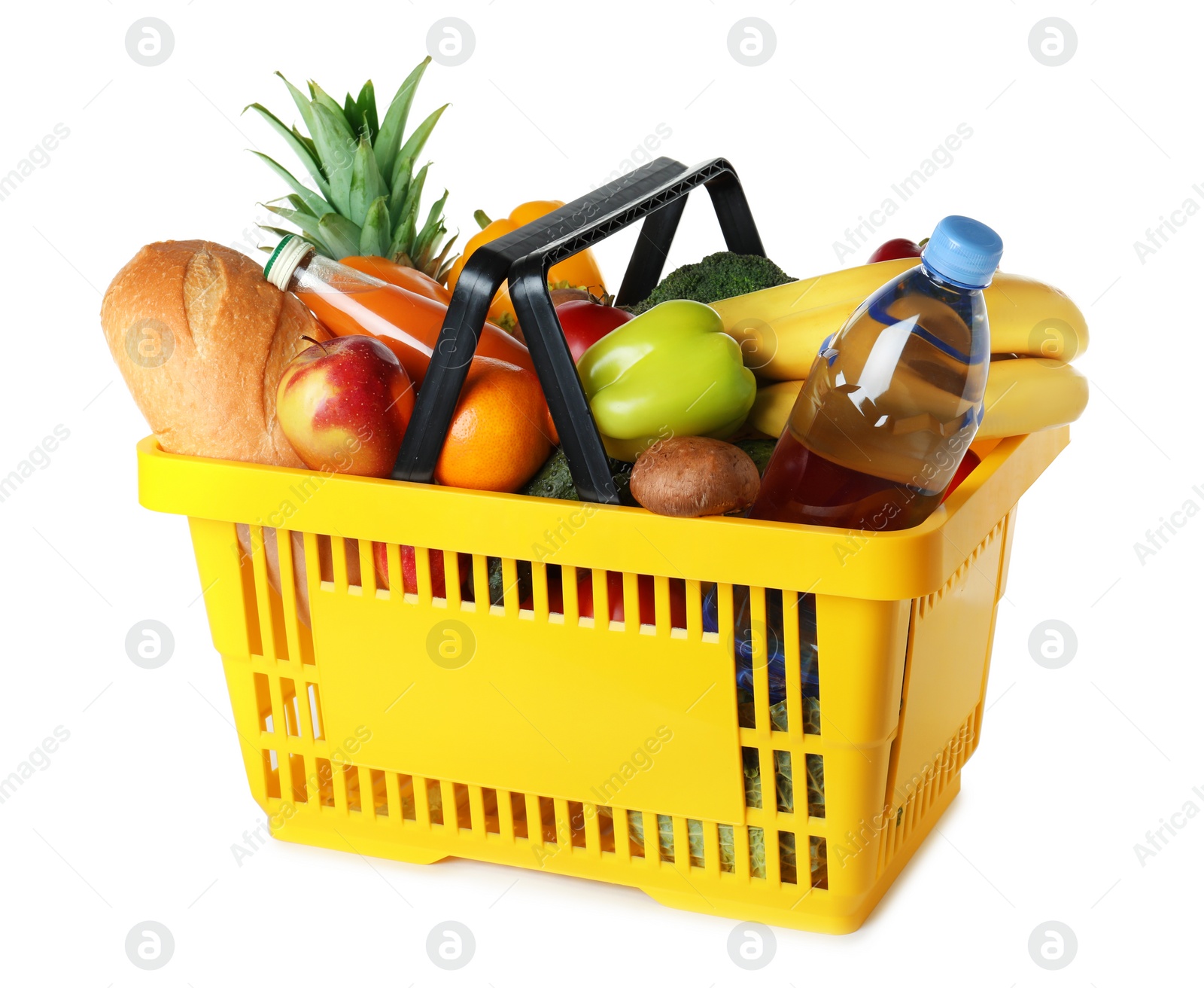 Photo of Shopping basket with grocery products on white background