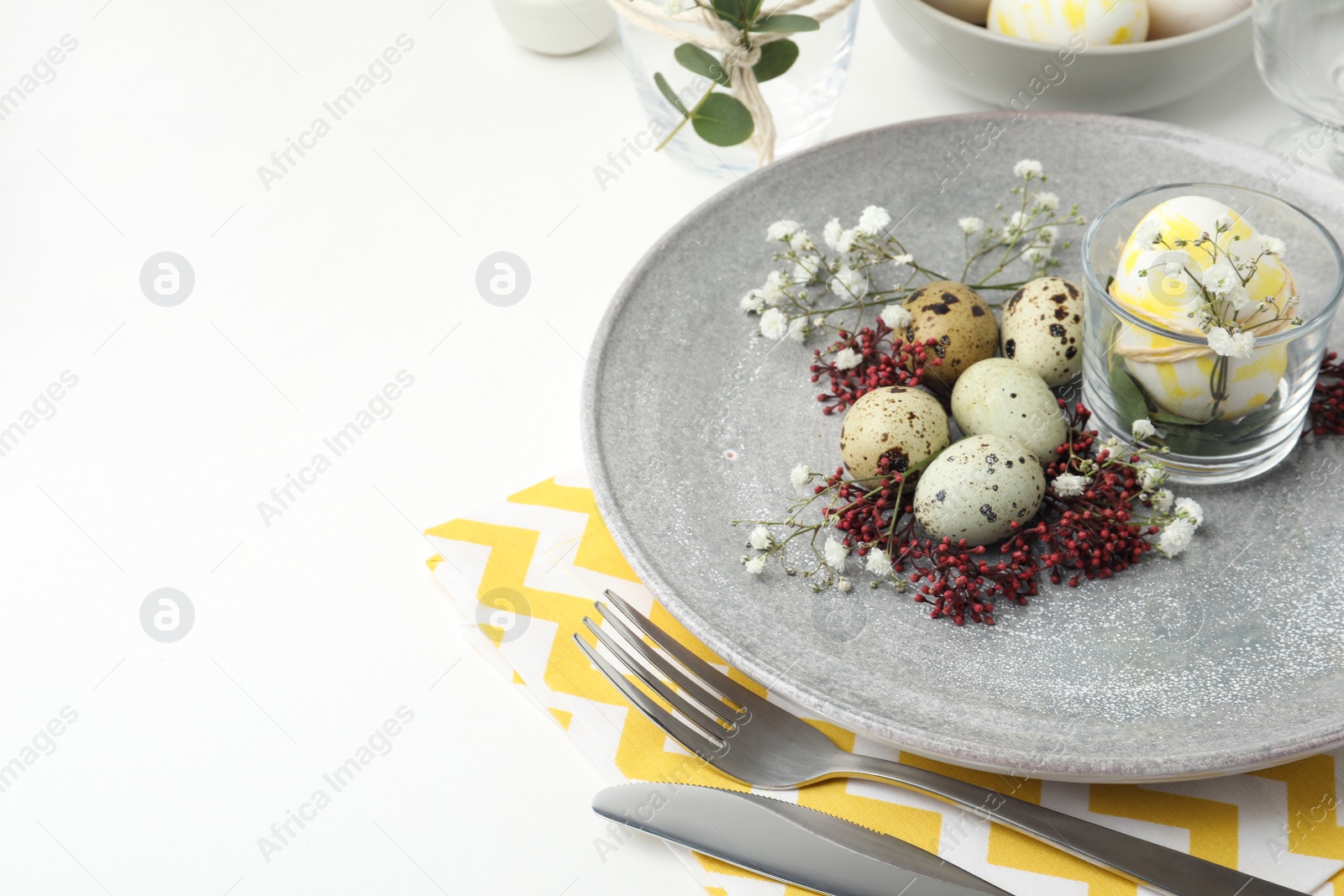 Photo of Festive Easter table setting with beautiful floral decor. Space for text