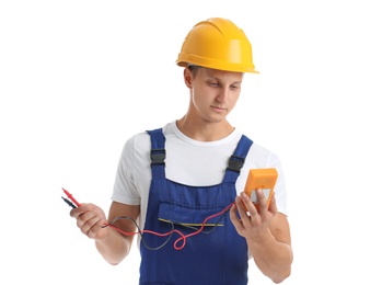 Electrician with multimeter wearing uniform on white background