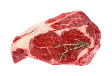 Photo of Piece of fresh beef meat and thyme isolated on white, top view