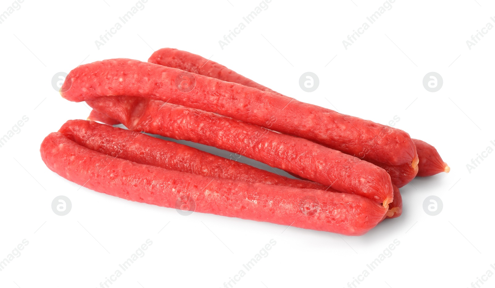 Photo of Thin dry smoked sausages isolated on white