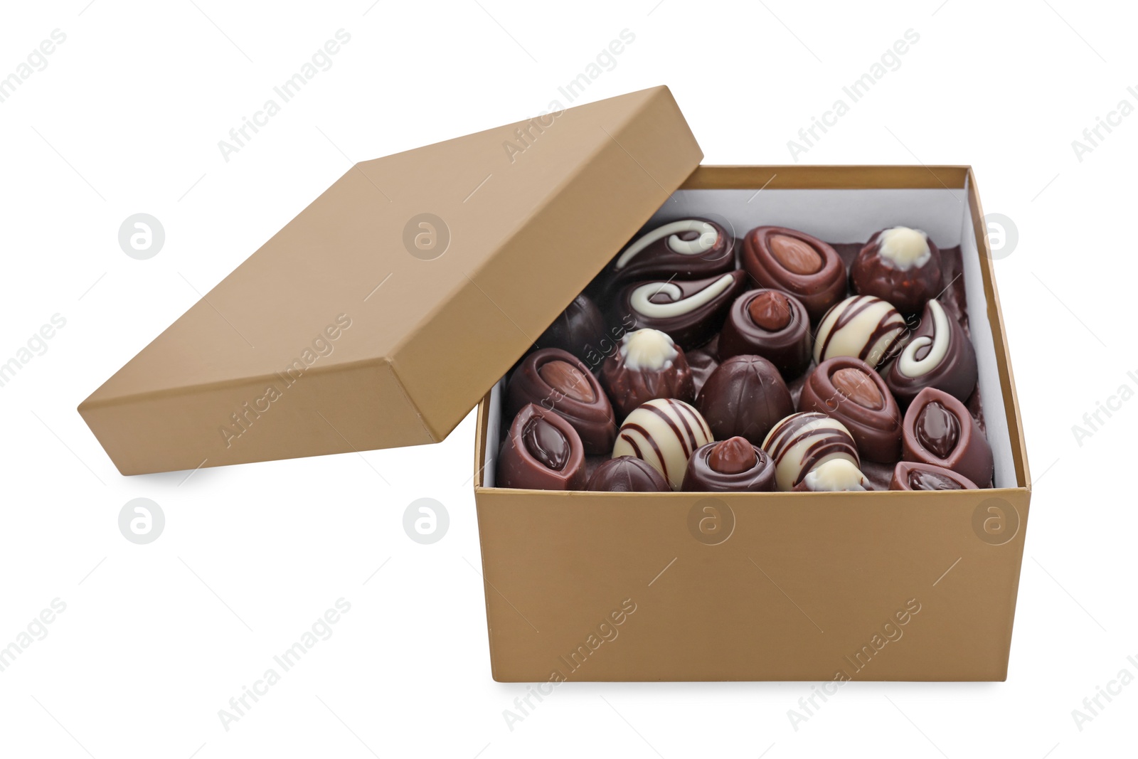 Photo of Box of delicious chocolate candies isolated on white