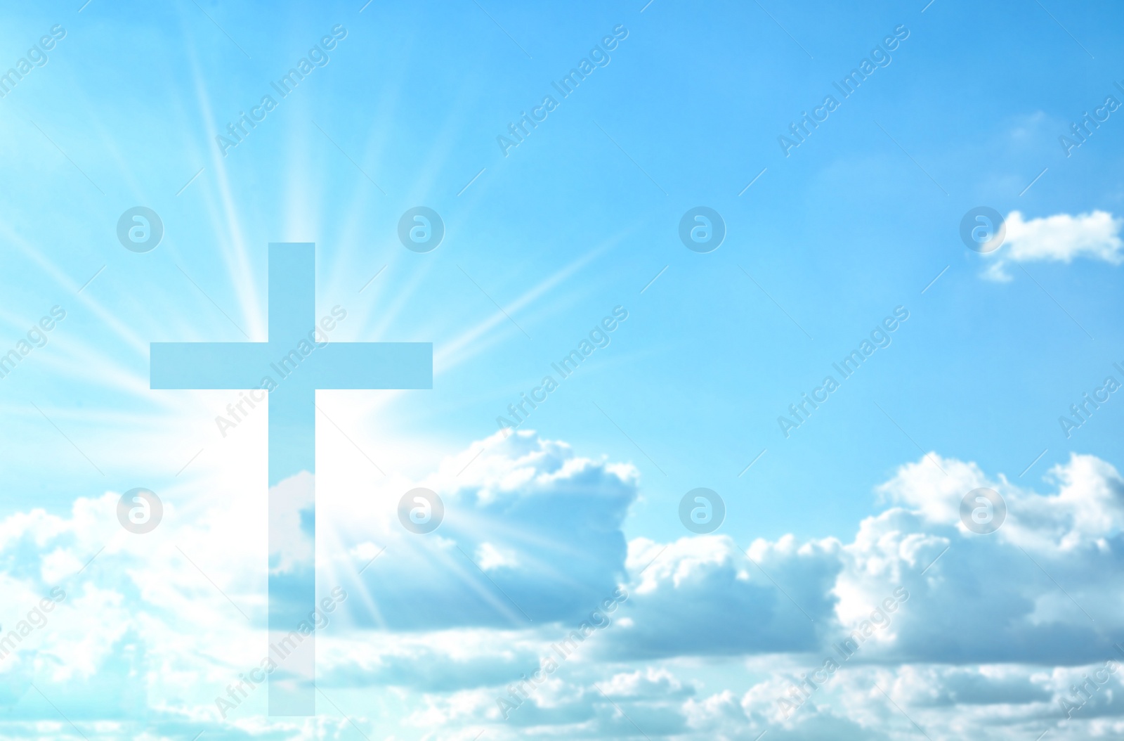 Image of Silhouette of cross against blue sky. Christian religion