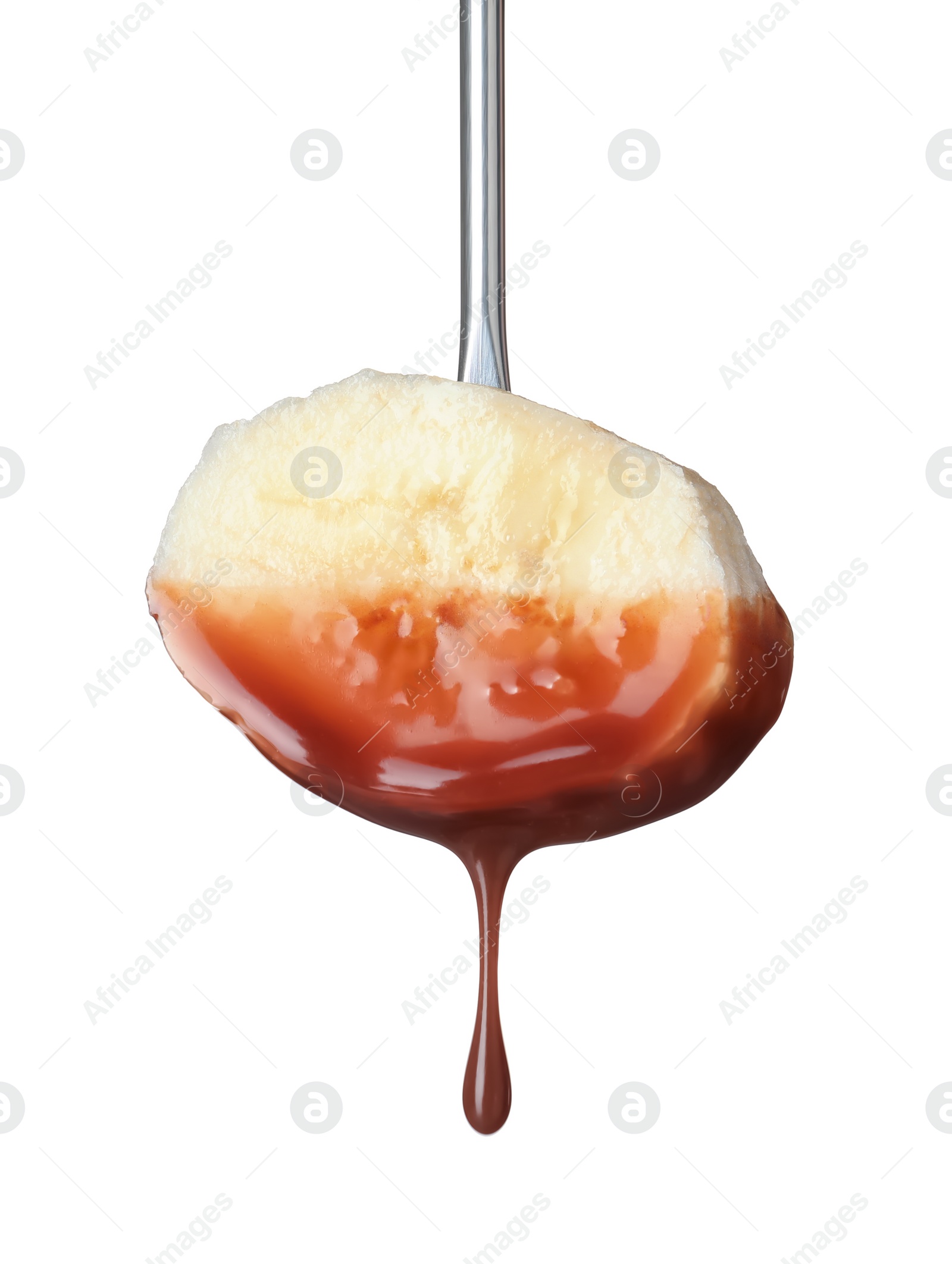 Photo of Banana with chocolate on fondue fork against white background