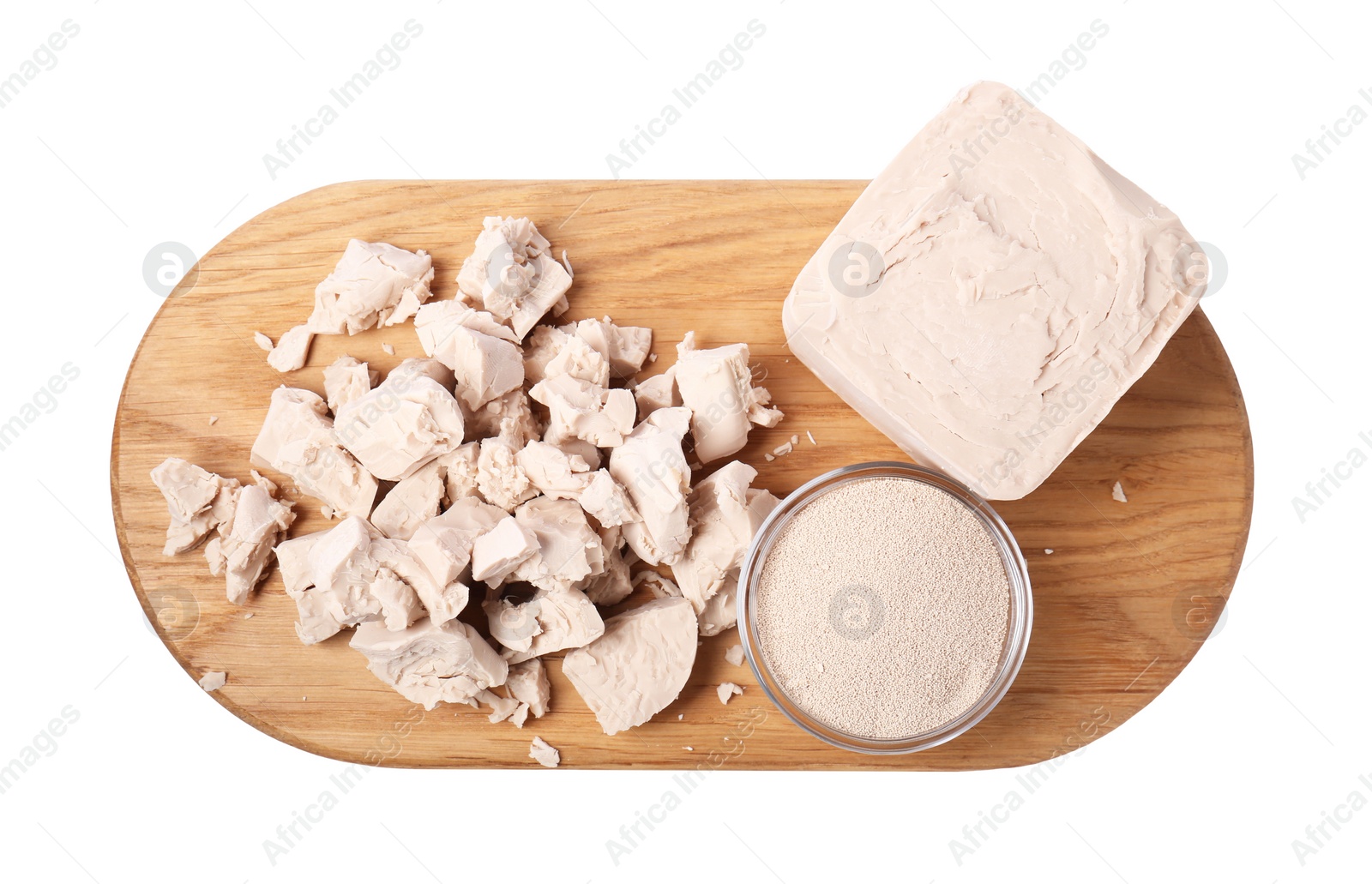 Photo of Compressed and granulated yeast isolated on white, top view