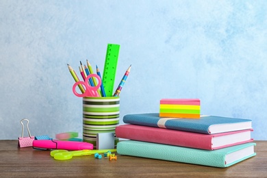 Photo of Different colorful stationery on table. Back to school