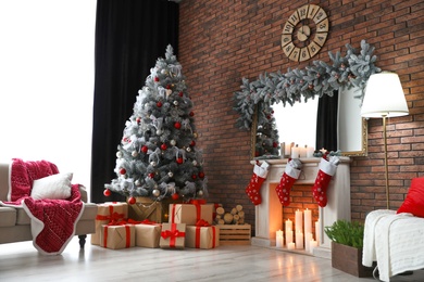 Photo of Stylish room interior with beautiful Christmas tree