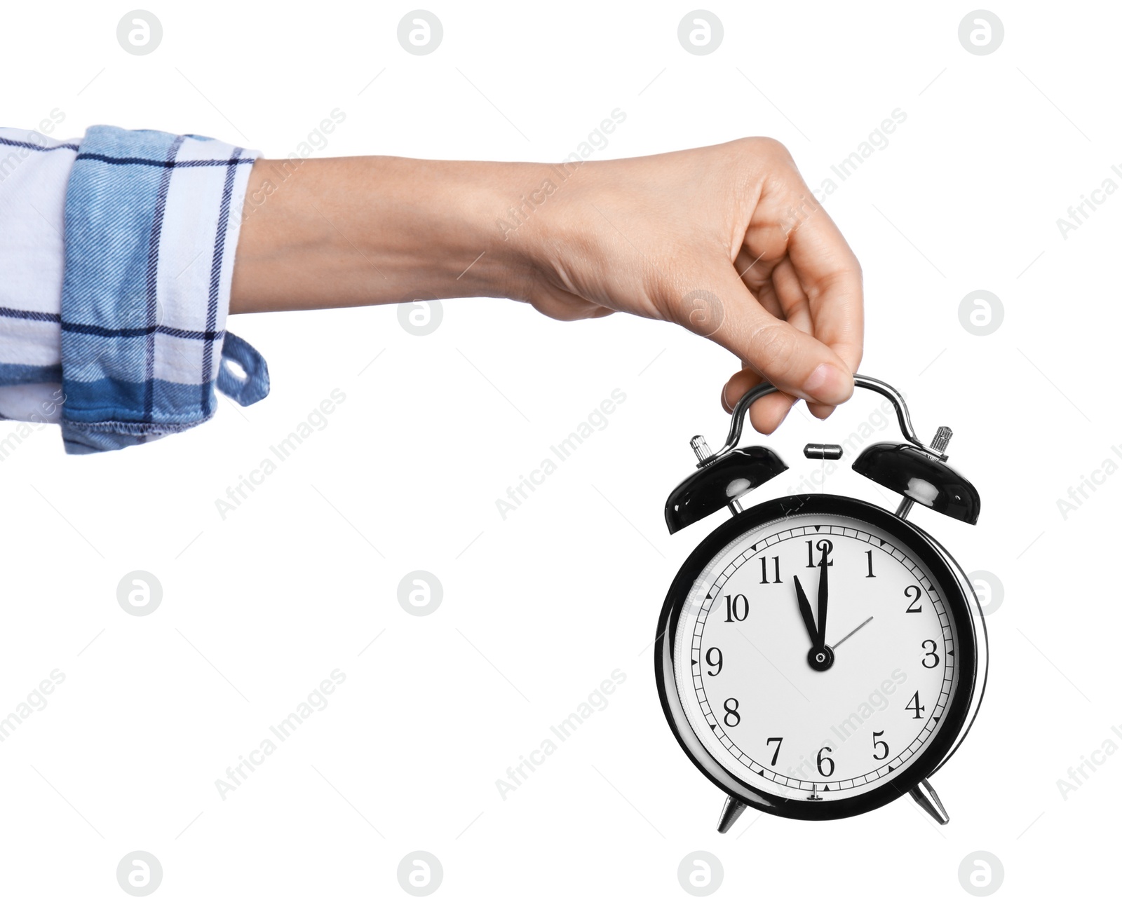 Photo of Young woman holding clock on white background. Time management