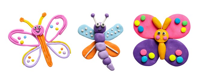 Image of Set with different colorful plasticine butterflies on white background, top view