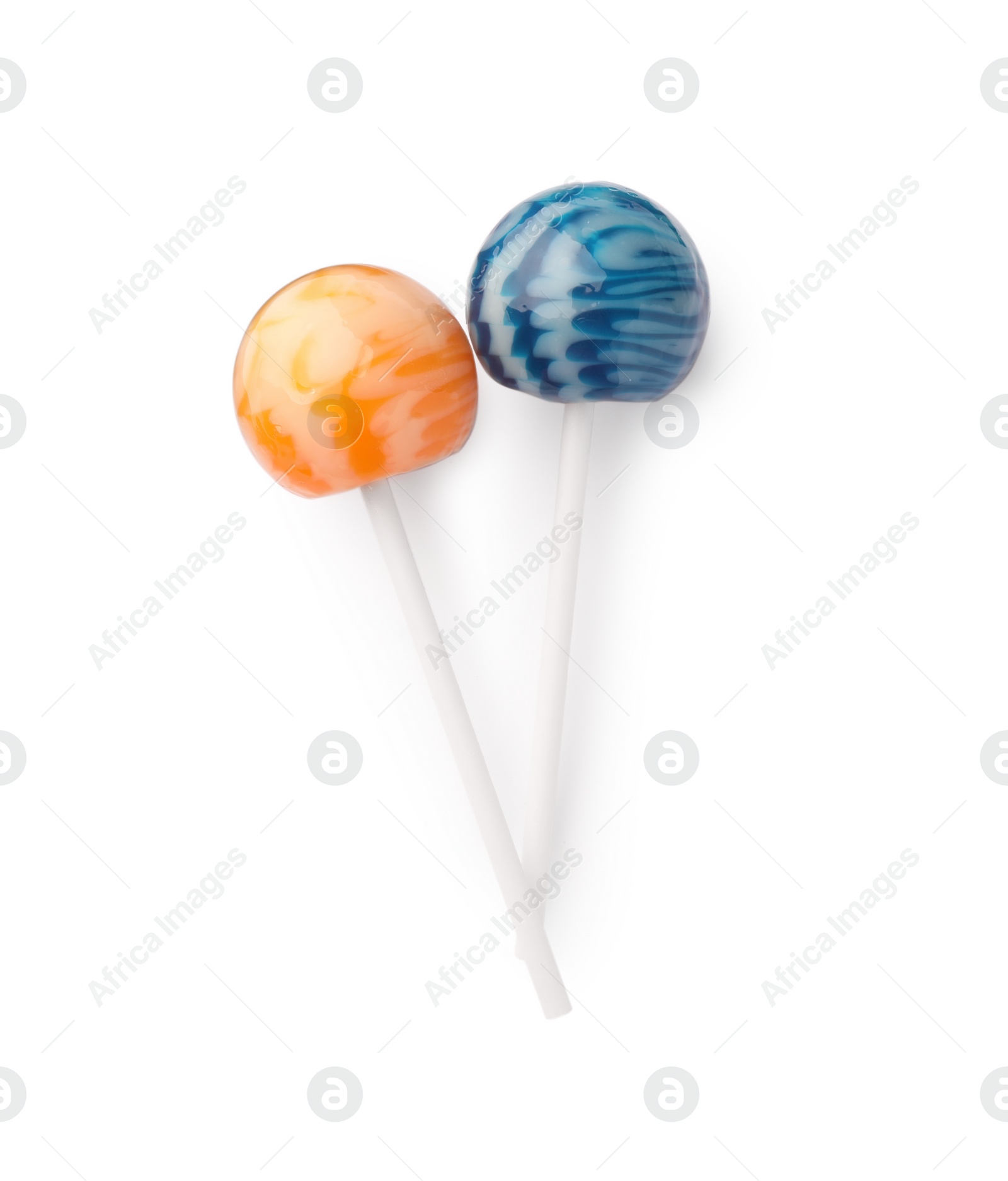 Photo of Two tasty lollipops isolated on white, top view