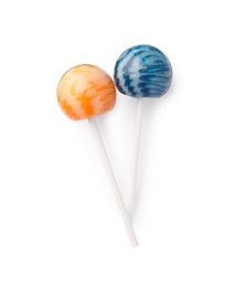 Photo of Two tasty lollipops isolated on white, top view