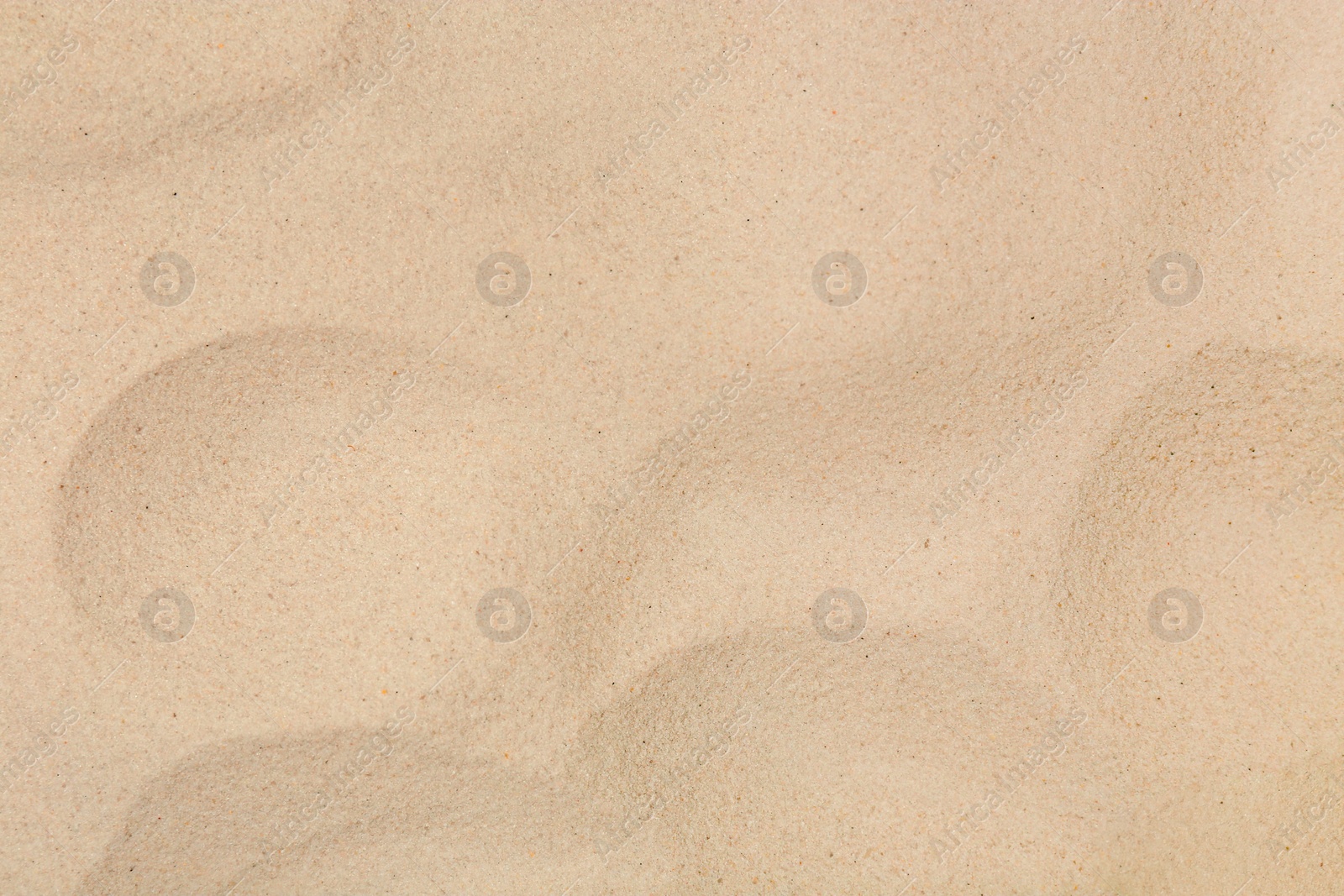 Photo of Dry beach sand as background, top view