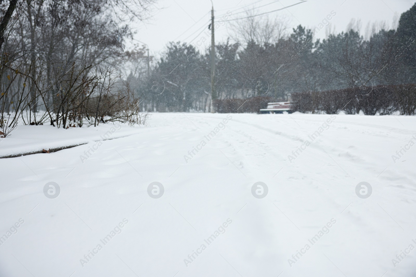 Photo of City street covered with snow in winter