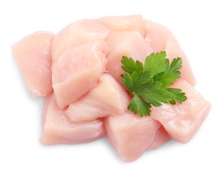 Photo of Cut raw chicken breast with parsley on white background, top view
