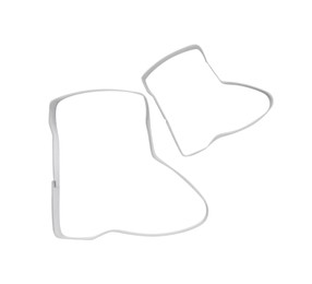 Photo of Boot shaped cookie cutters on white background, top view