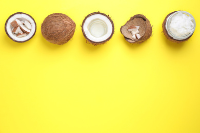 Photo of Flat lay composition with coconut oil on yellow background, space for text
