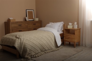 Photo of Stylish light room with comfortable bed. Interior design