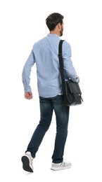 Photo of Man with bag in stylish outfit walking on white background, back view