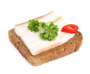 Photo of Pork fatback sandwich with parsley and slice of pepper isolated on white