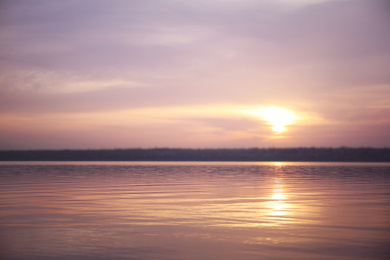 Photo of Picturesque view of beautiful sunset on riverside