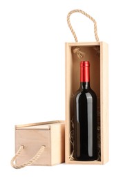 Photo of Wooden gift boxes with wine isolated on white