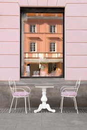 Photo of WARSAW, POLAND - MARCH 22, 2022: Beautiful view of modern cafe with outdoor terrace