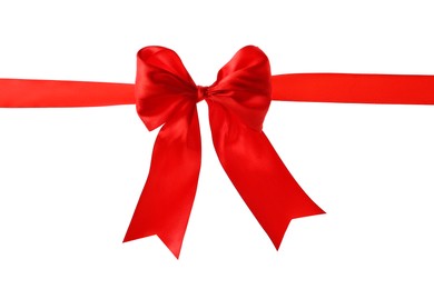 Photo of Red ribbon with bow on white background. Festive decoration