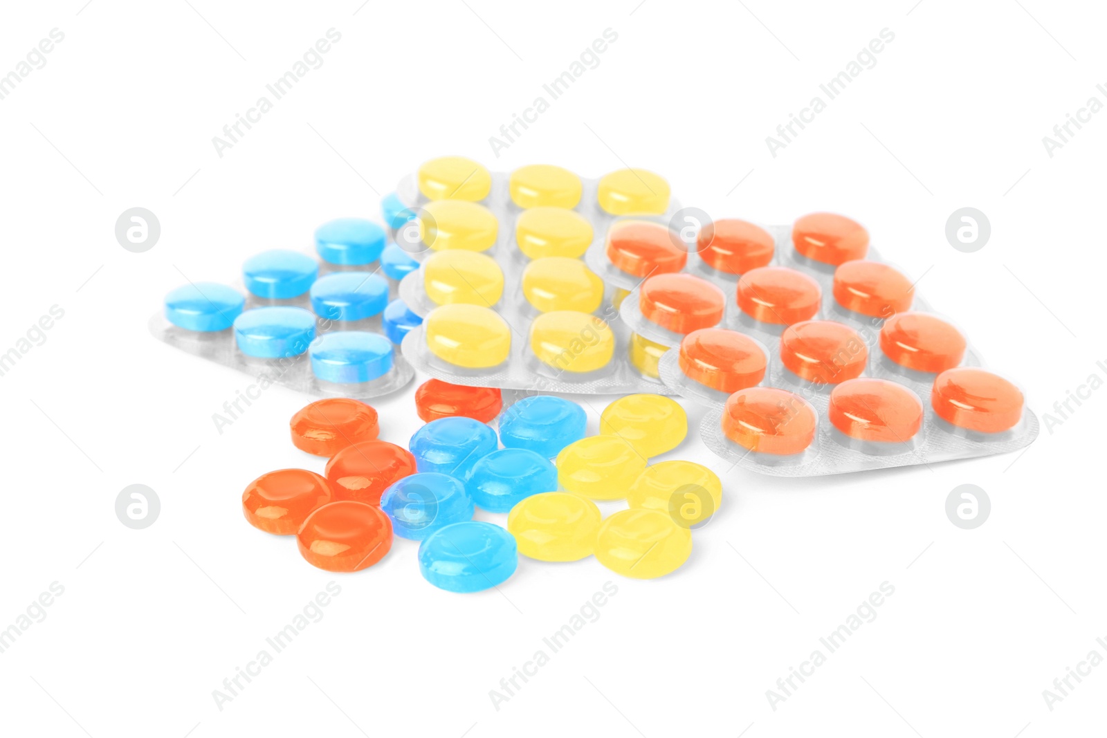 Photo of Blisters and many colorful cough drops on white background