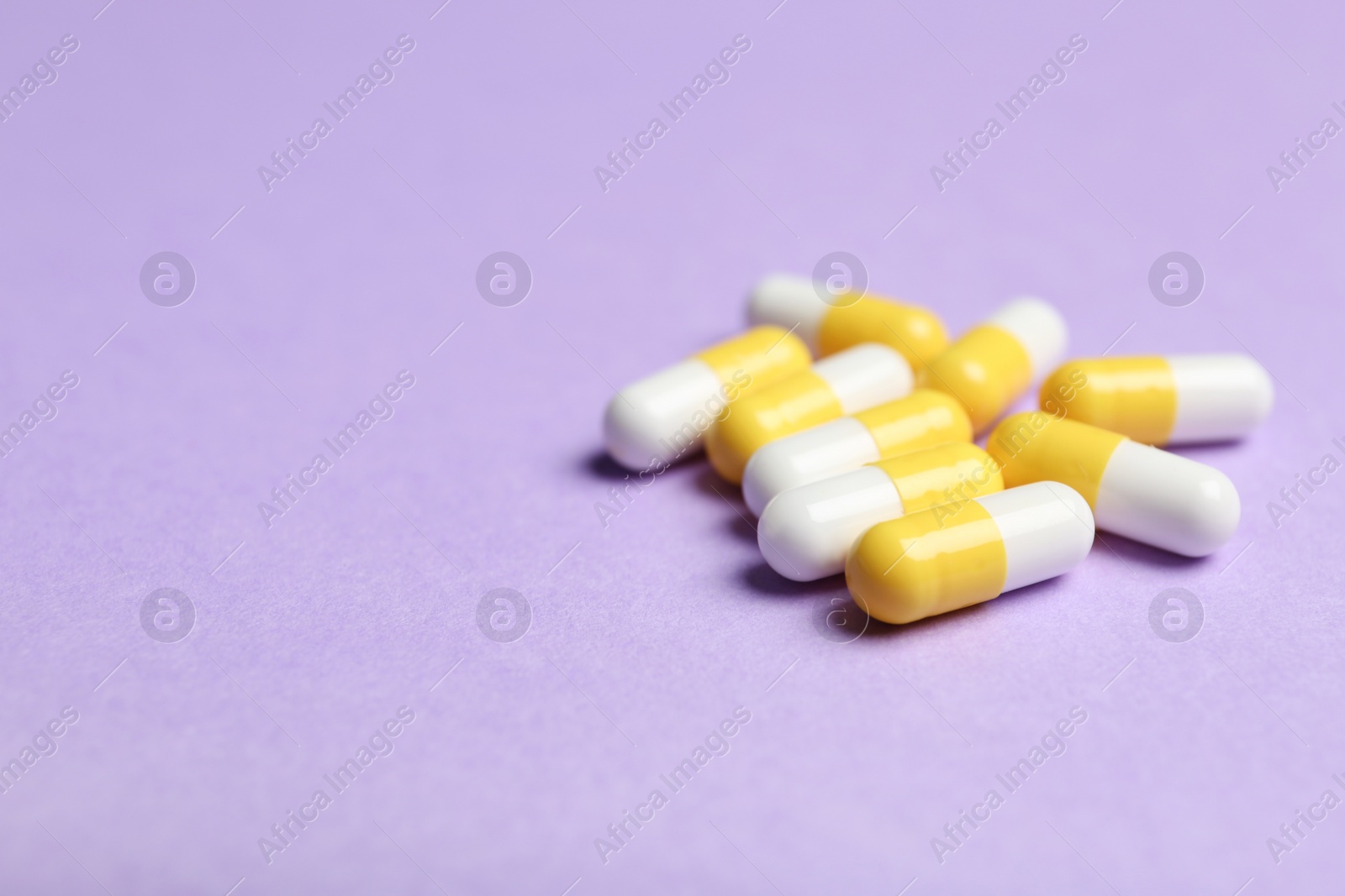 Photo of Pills and space for text on color background