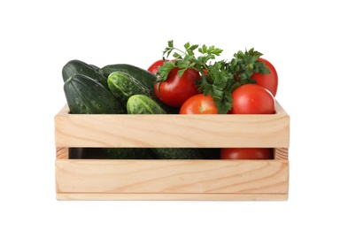 Photo of Wooden crate full of fresh vegetables on white background