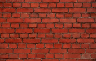 Photo of Texture of red brick wall as background