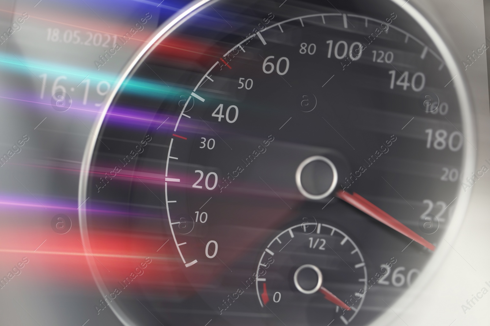 Image of Speedometer on dashboard in car, motion blur effect