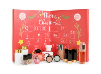 Photo of Christmas advent calendar with different cosmetics and perfumes isolated on white