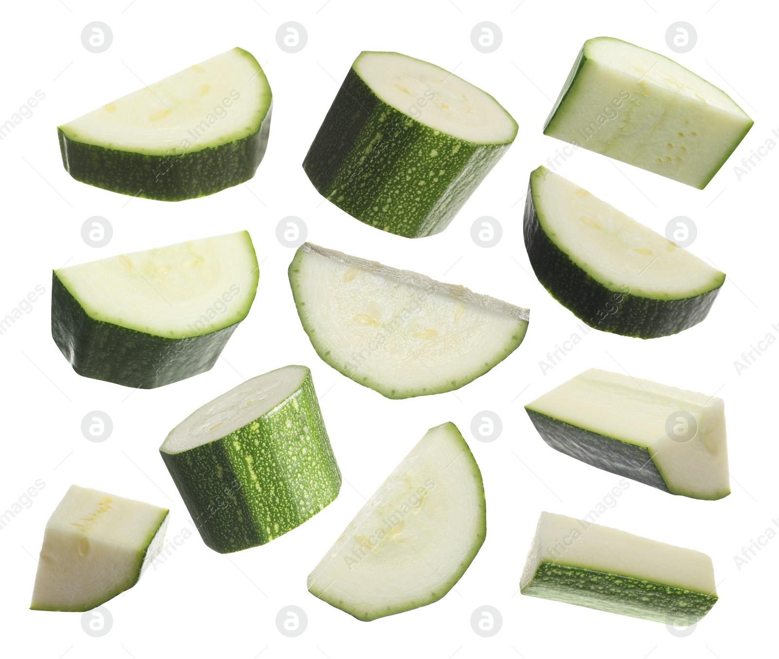 Image of Set with pieces of fresh ripe zucchini on white background